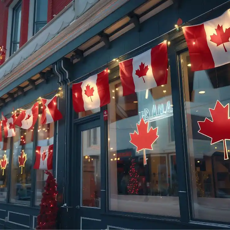 Vetrina negozio con tante bandiere del Canada all'esterno e diverse foglie di acero, simbolo canadese.